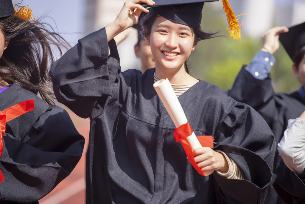 Beautiful Asian Graduation Student Girl  Holding Diploma And Run