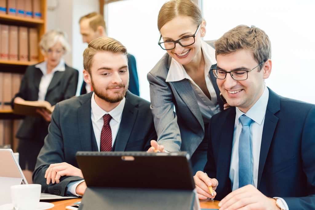 Young but diligent Lawyers in their law firm working on computer