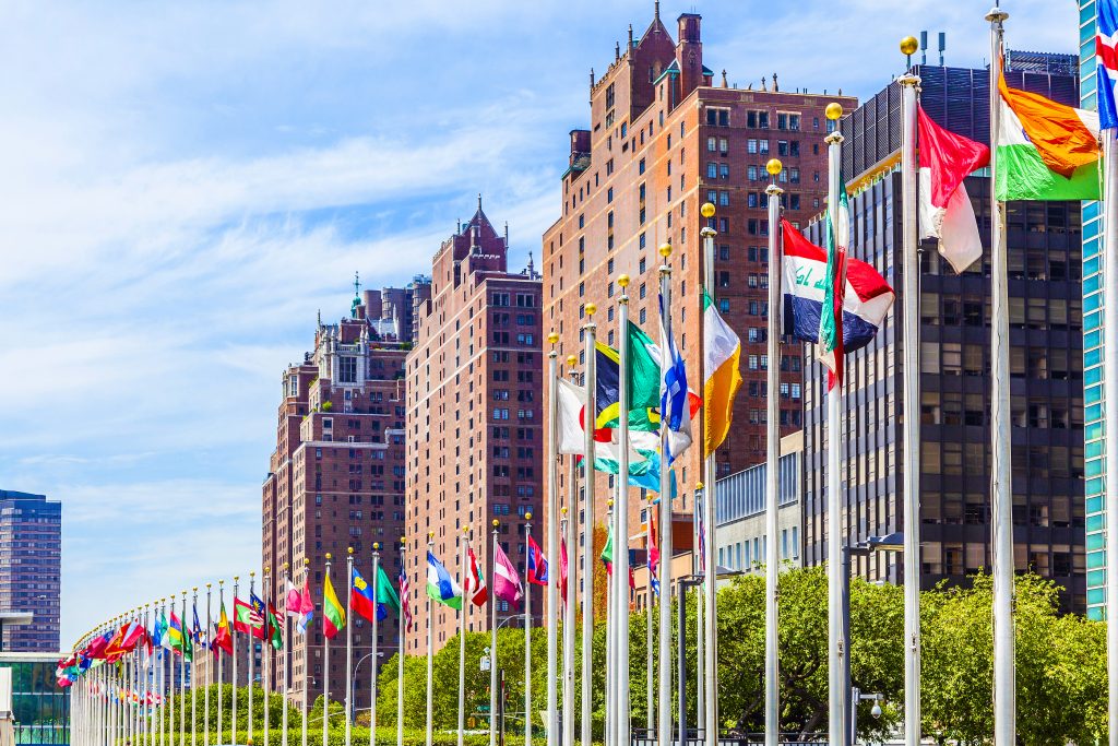 United Nations Headquarters With Flags Of Members Of The Un